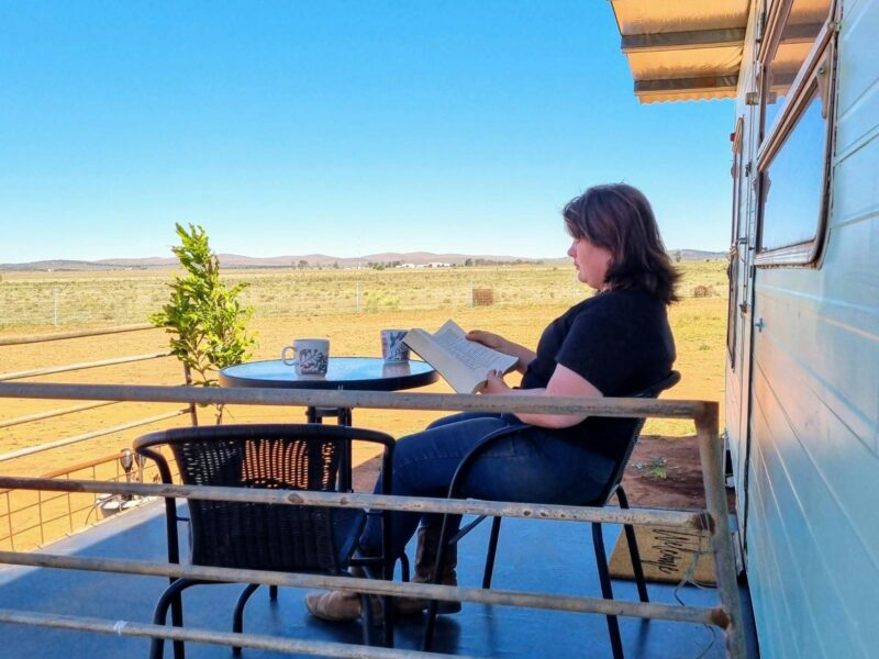 Sitting on the deck with a coffee and a book, watching the horizon