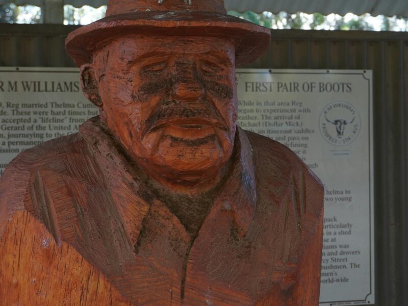 RM Williams wooden statue cut out of a single piece of wood by a chainsaw.