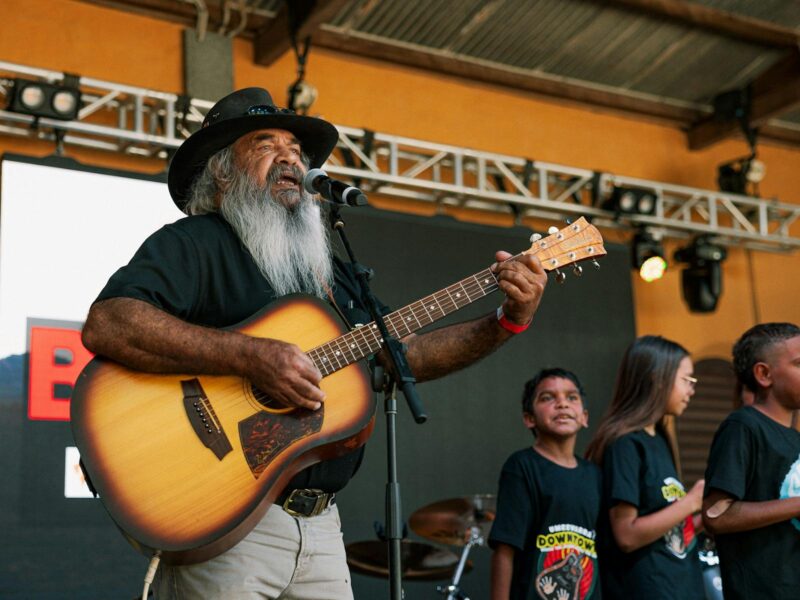Vince Coulthard performing with Club Umee kids